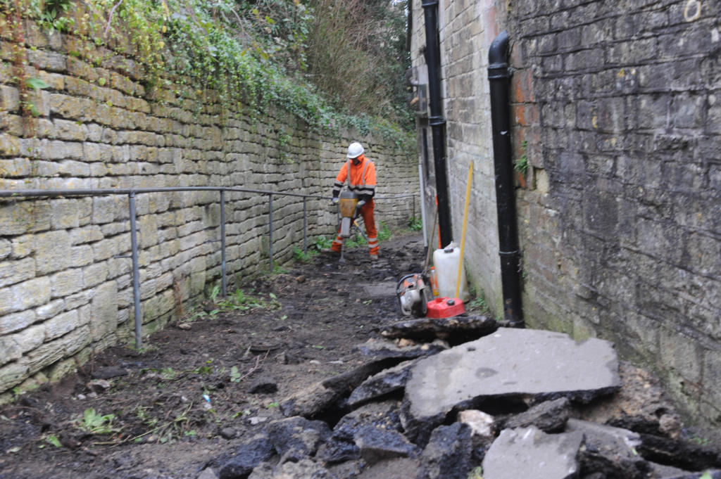 Work under way to relace the tarmac footpath and replace with pave stones on Church Street