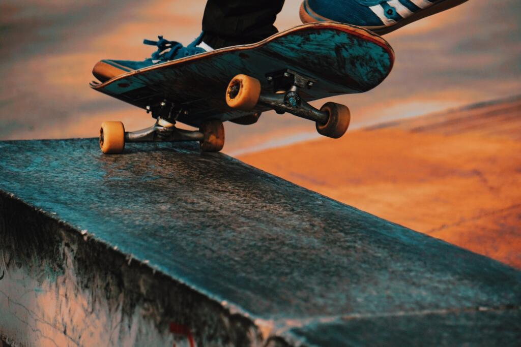 close up of a skateboard mid trick