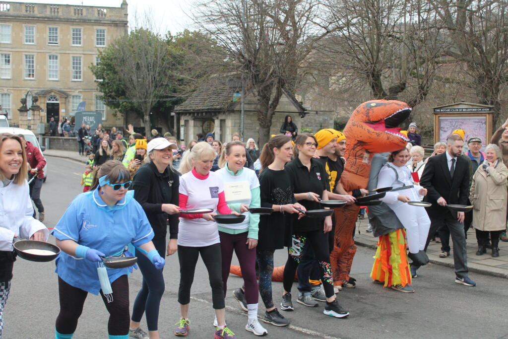 Pancake Race 2023 Runners lining up to begin the race