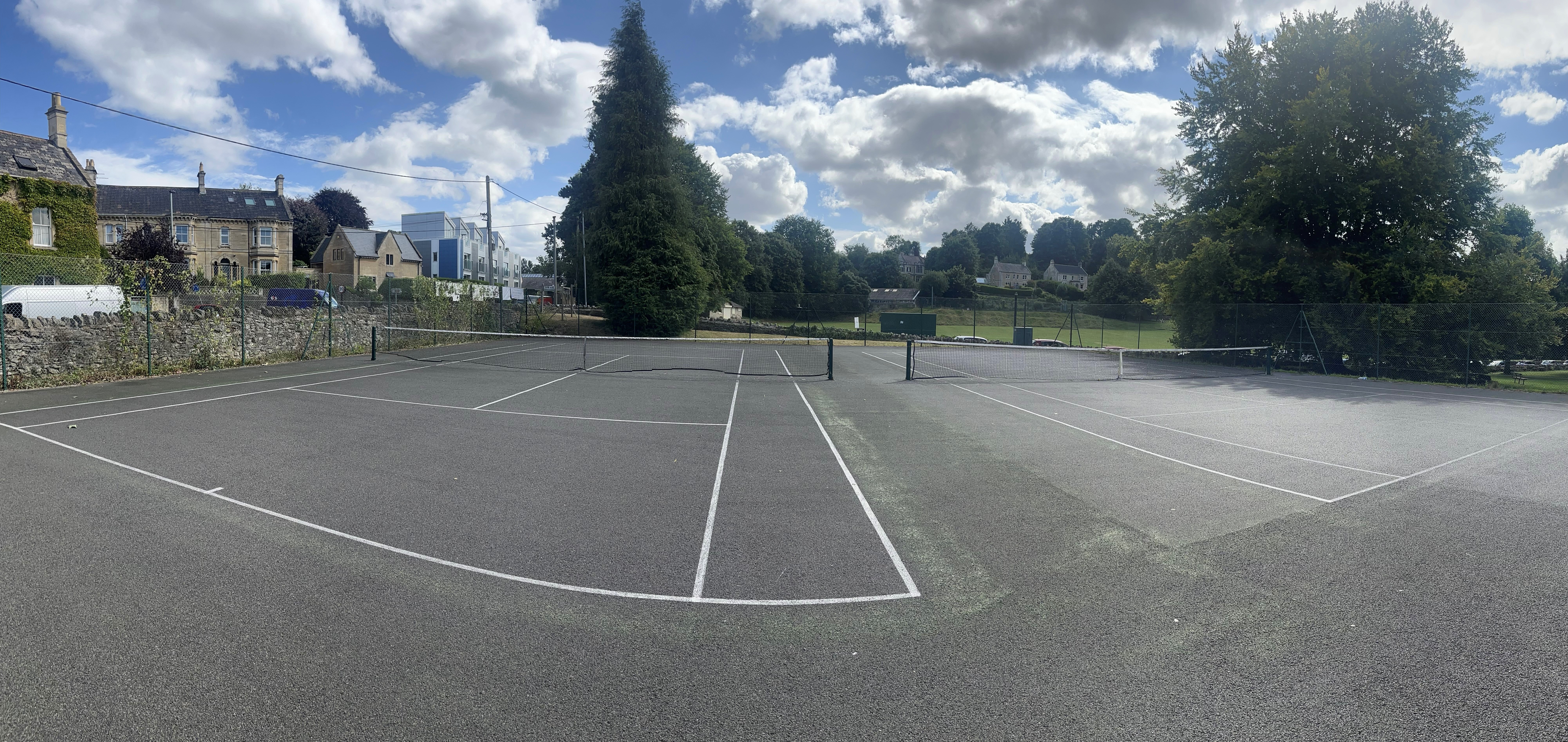 Panorama photo of the second and third tennis courts at Culver Close, Bradford on Avon.